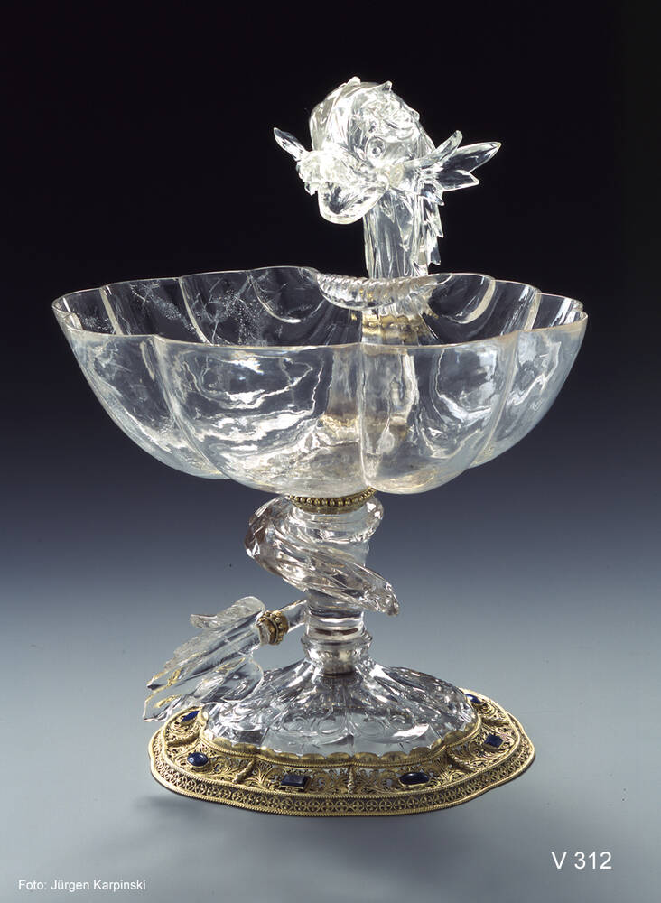 Shell-shaped bowl with dolphin
