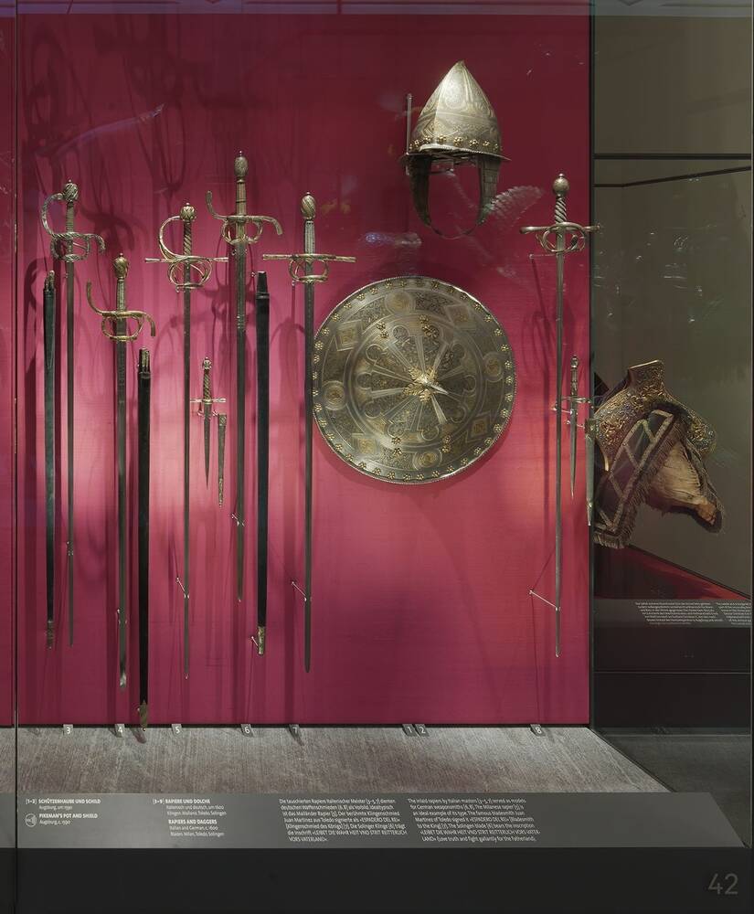 Schützenhaube und Schild, Rapiere und Dolch